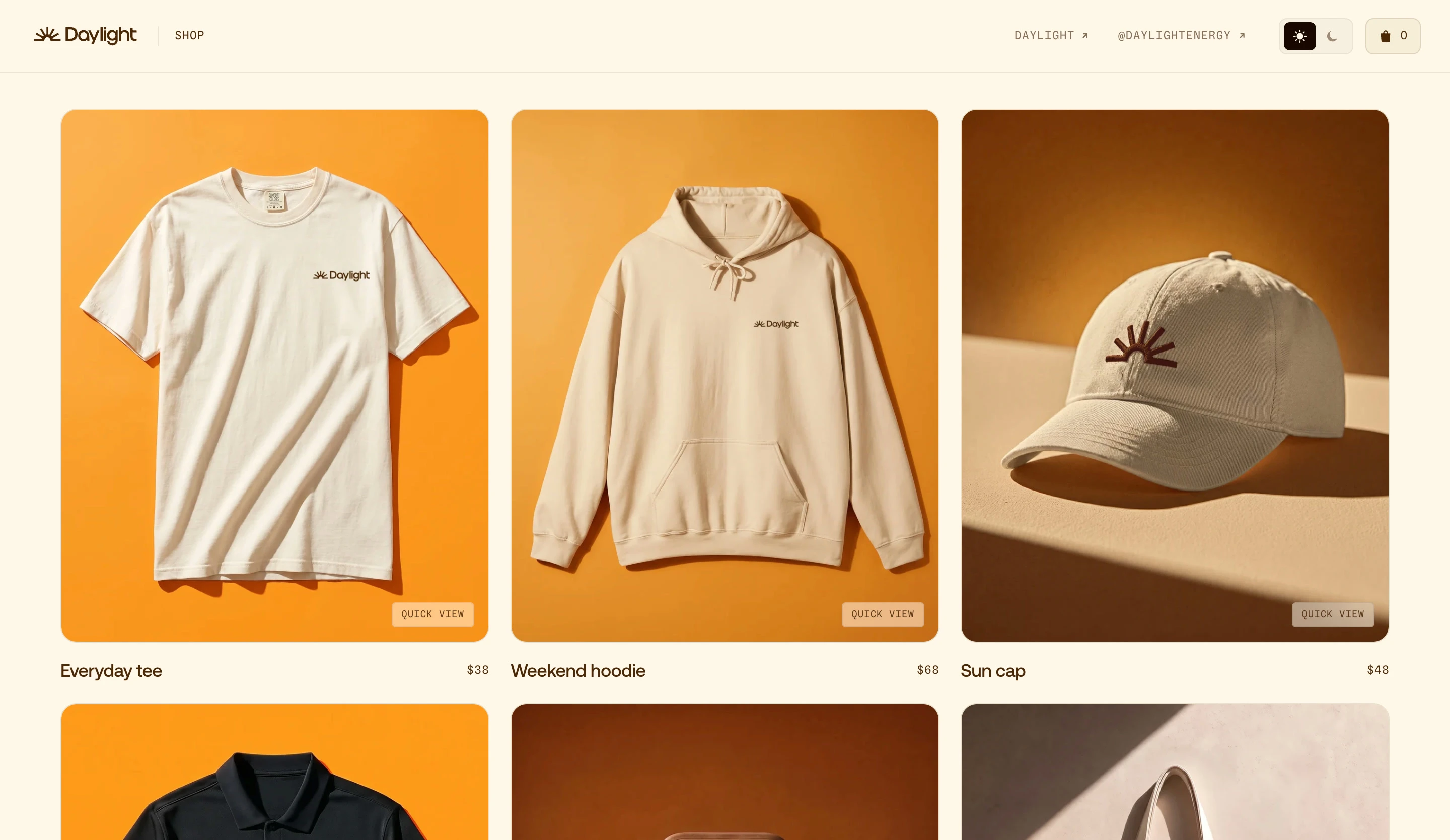 Daylight merch store page with a tee, hoodie and cap